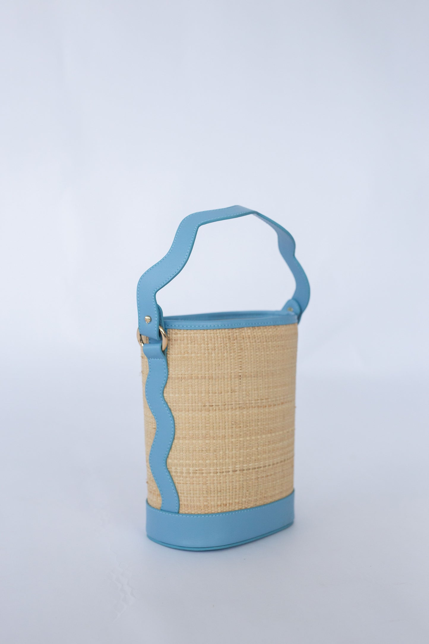 Woven bag with blue accents on a white background