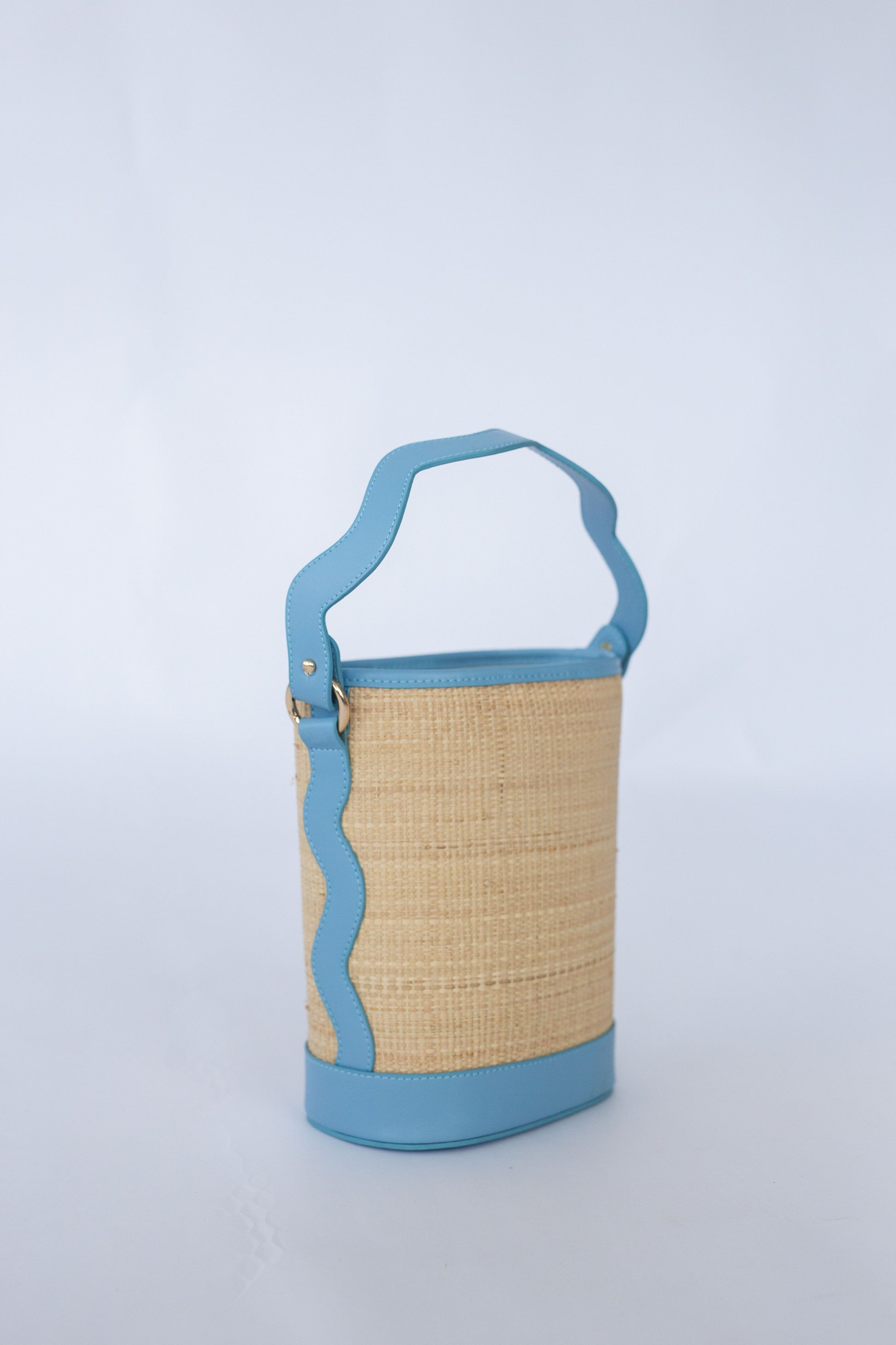 Woven bag with blue accents on a white background