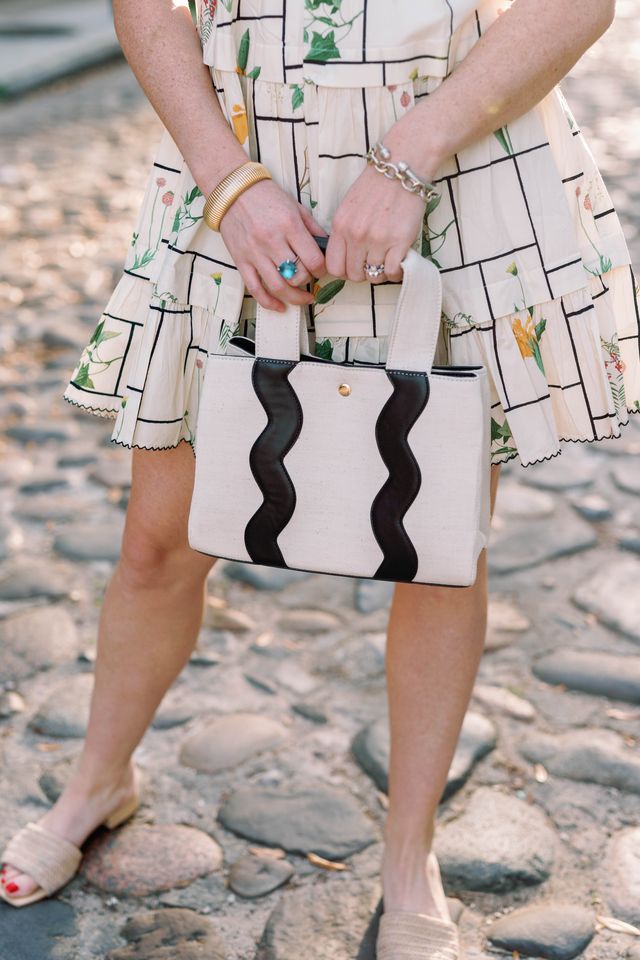 Breck & Grier signature Sydney canvas tote handbag in a solid neutral colorway featuring the iconic scallop design trim.