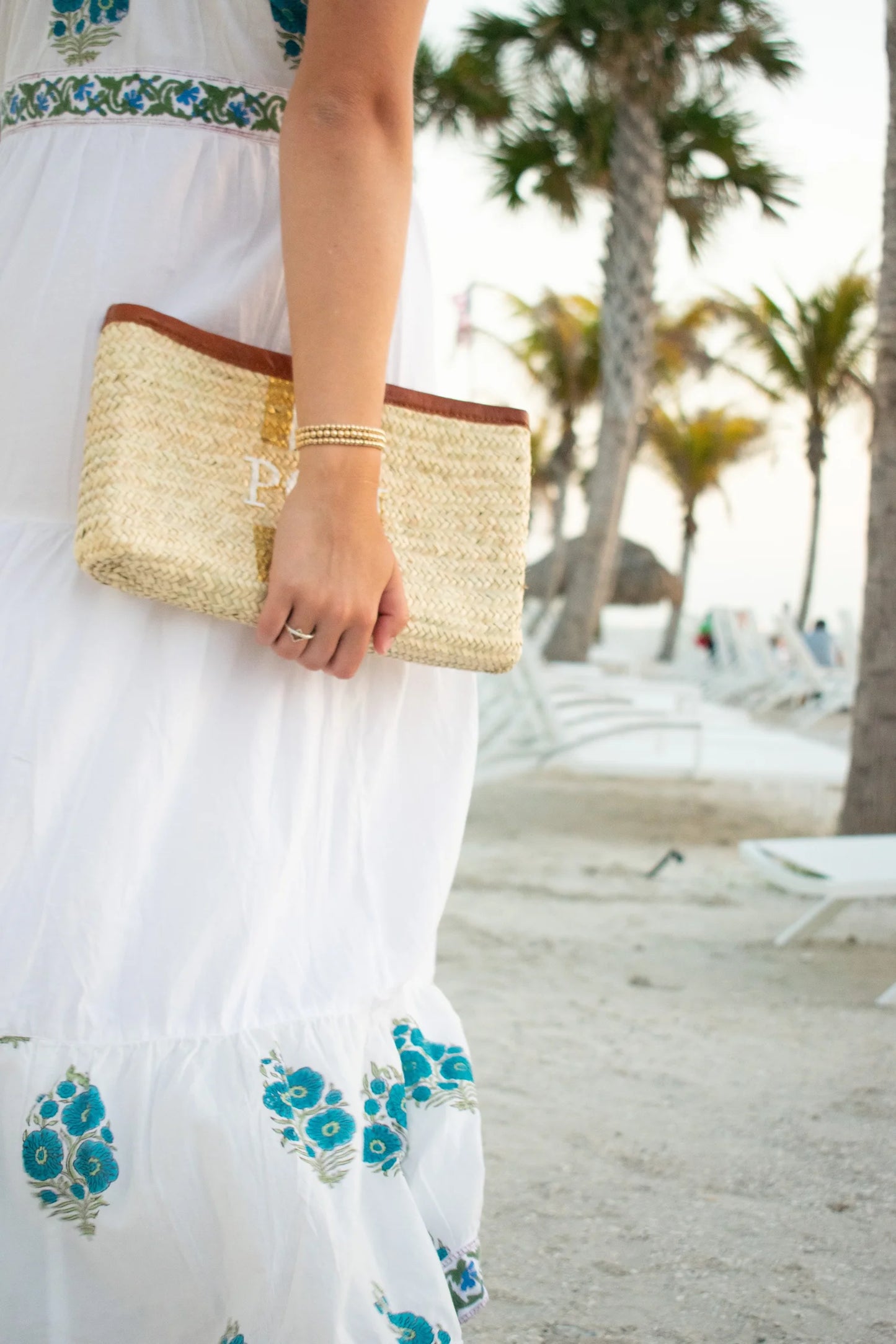 Custom monogrammed hand painted travel pouches and clutches by Breck and Grier