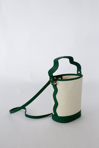 Canvas bag with green accents on a white background