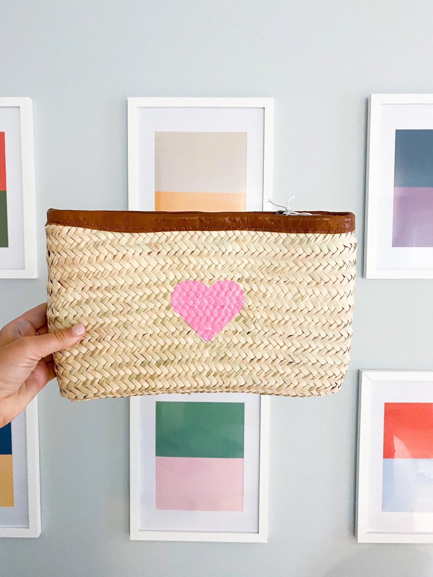 Breck and Grier envelope straw clutch bag with a custom hand painted heart design